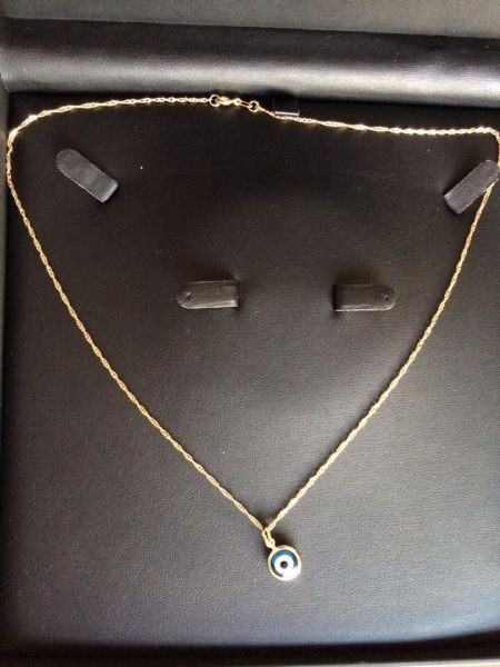 Pingente um olho banhado a ouro 18kl